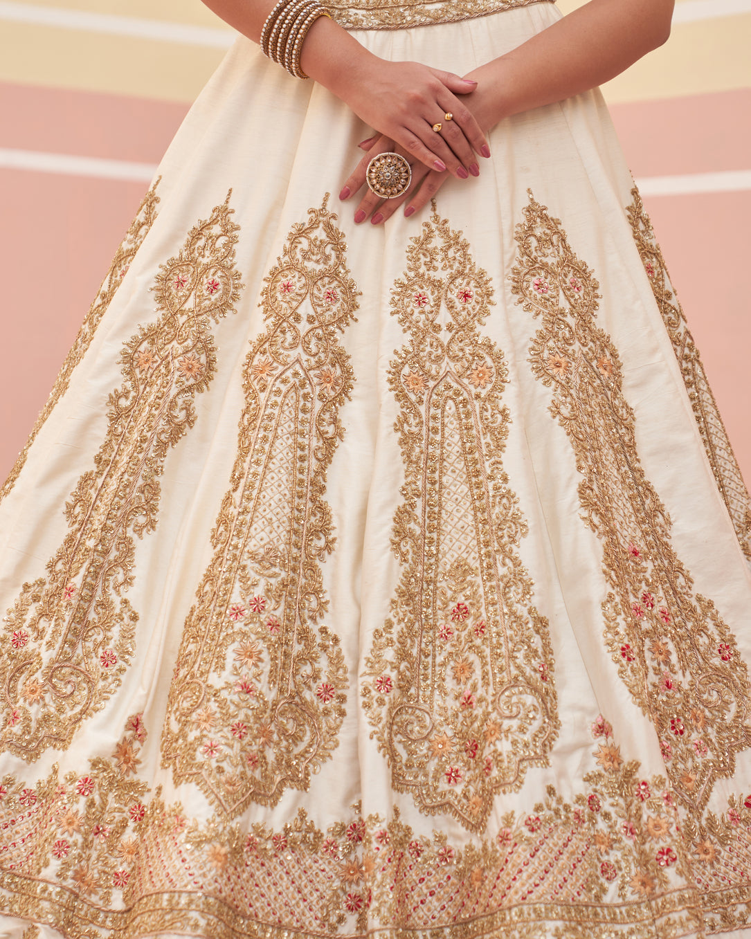 Ivory raw silk lehenga set adorned with intricate beadwork and sequins