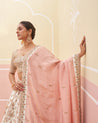 Graceful ivory raw silk lehenga set perfect for a classic bridal look