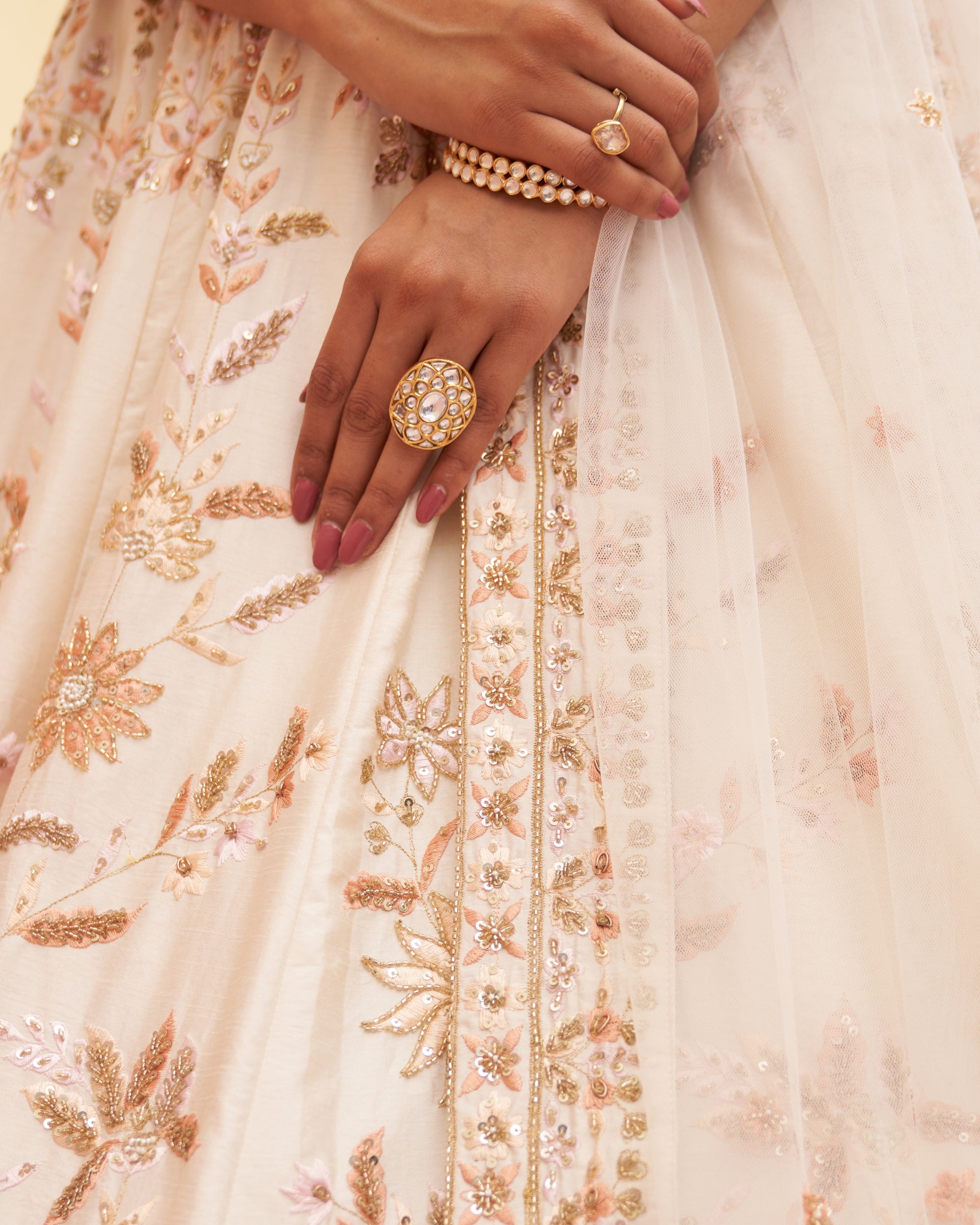 Exquisite ivory raw silk lehenga set with intricate sequin embellishments