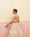 Sophisticated blush pink raw silk lehenga set for a timeless bridal look