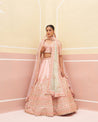 Stunning pink raw silk lehenga set for a radiant bridal look