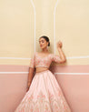 Sophisticated pink raw silk lehenga set with a timeless appeal