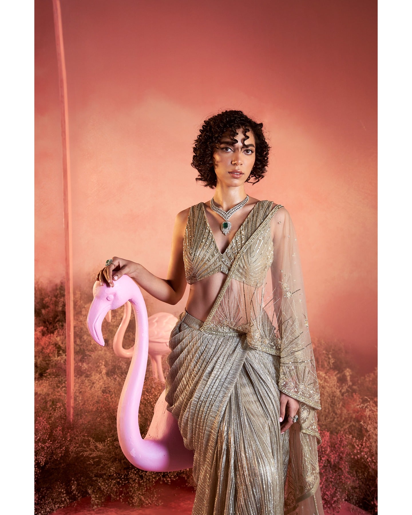 Elegance in Every Thread: Adorned with delicate hand embroidery, this off-white drape saree is a timeless masterpiece. 