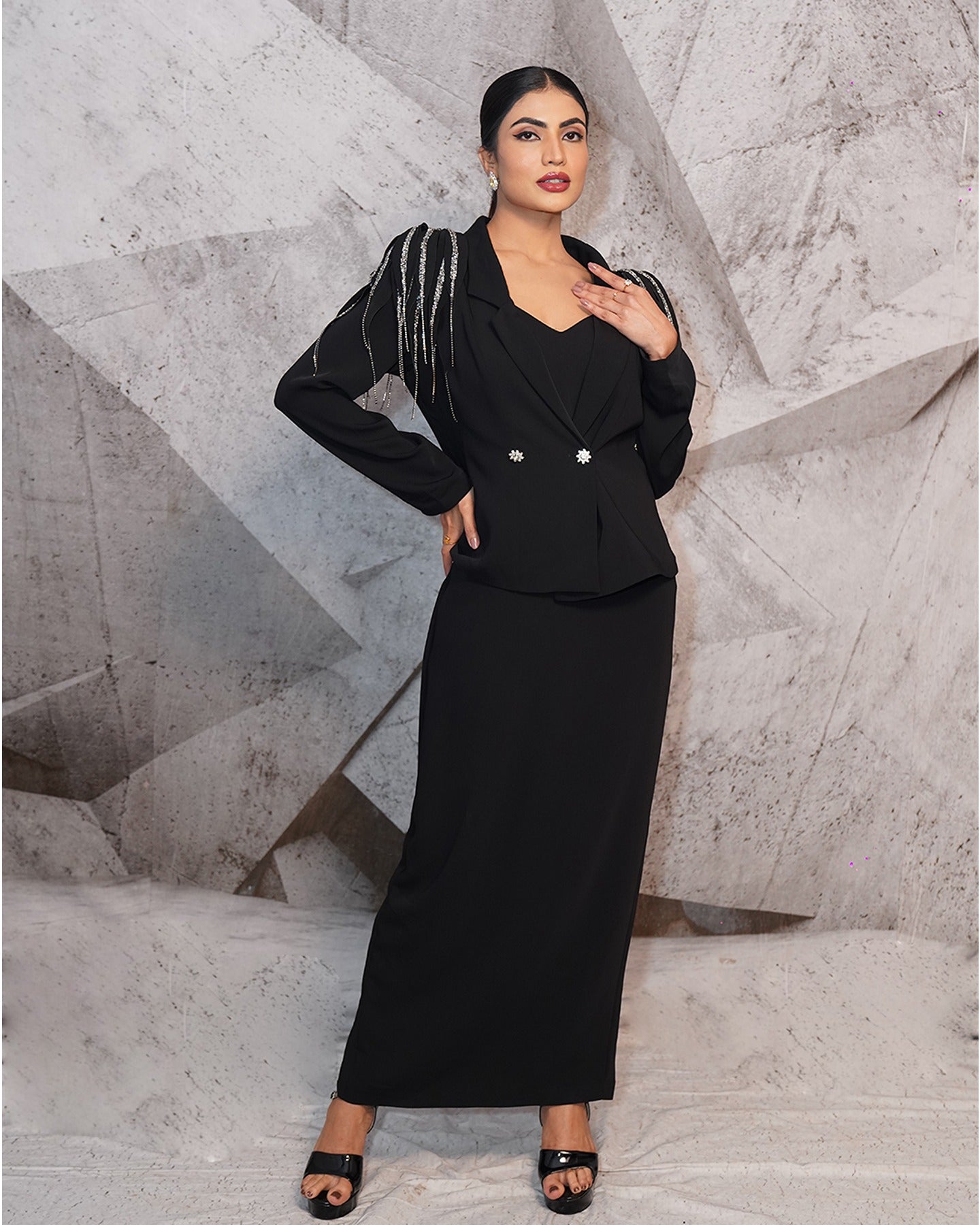 Elegance in every thread, strength in every silhouette. This black blazer suit exudes power and style, making every step a statement of confidence.