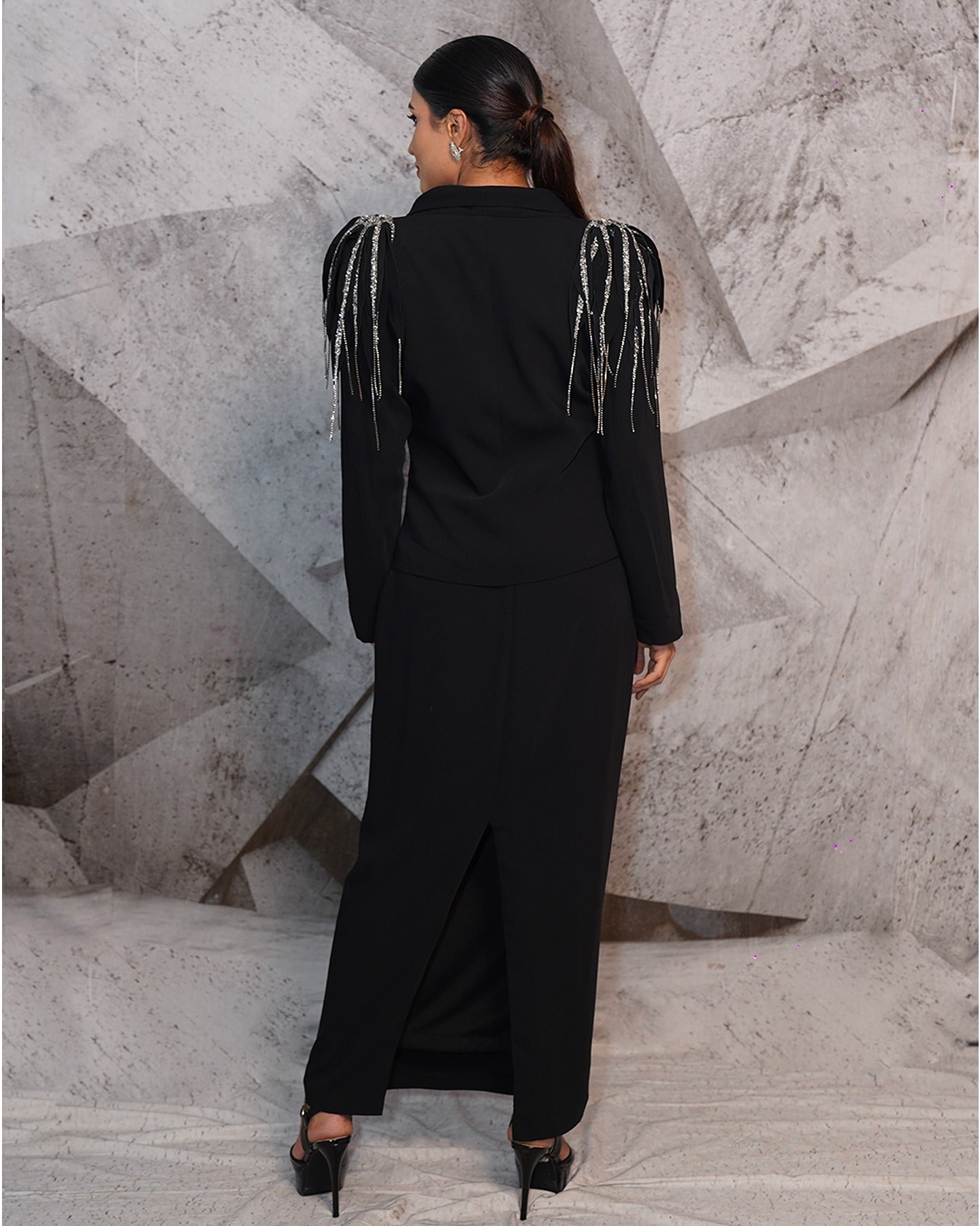 Elegance in every thread, strength in every silhouette. This black blazer suit exudes power and style, making every step a statement of confidence. 