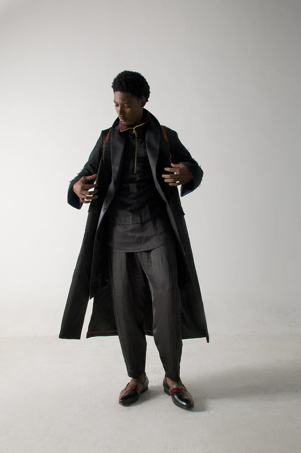 Step into the spotlight with our 'Orange is the new Black' Overcoat 