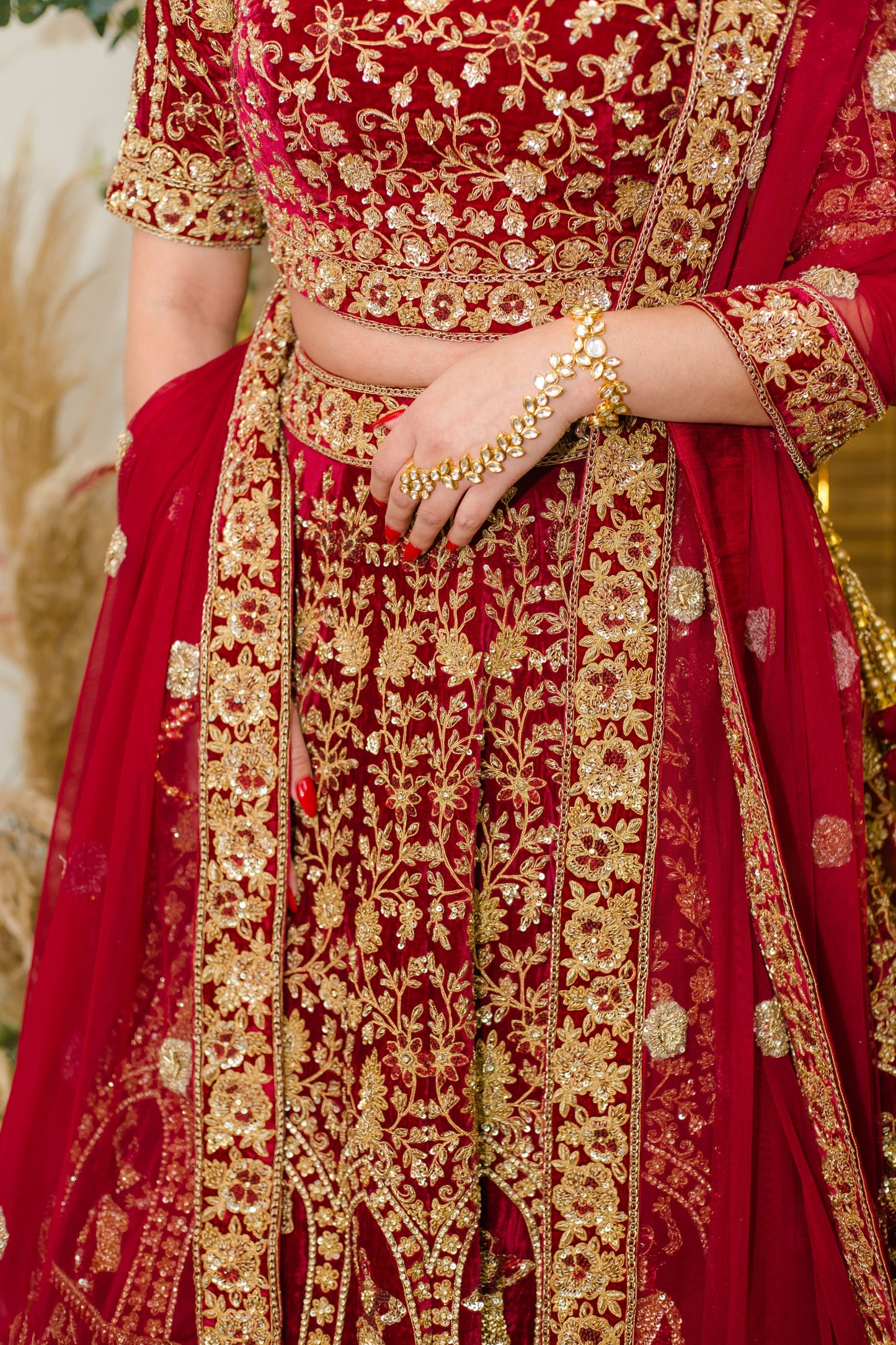 Burgundy velvet bridal lehenga choli with Zerkon, Dabka & Cutdana handwork