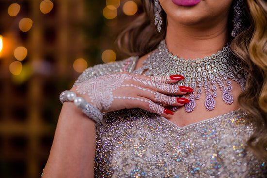 Baby Pink Netted Lehenga Choli with heavy Crystal and Sequins handwork