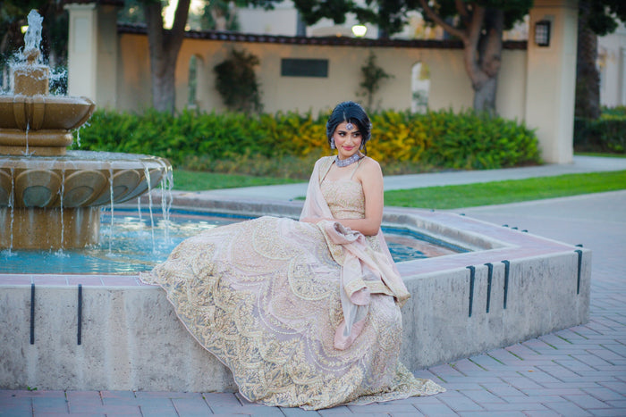 Nude net designer Lehenga choli with heavy Zari, Crystal & Sequins embroidery