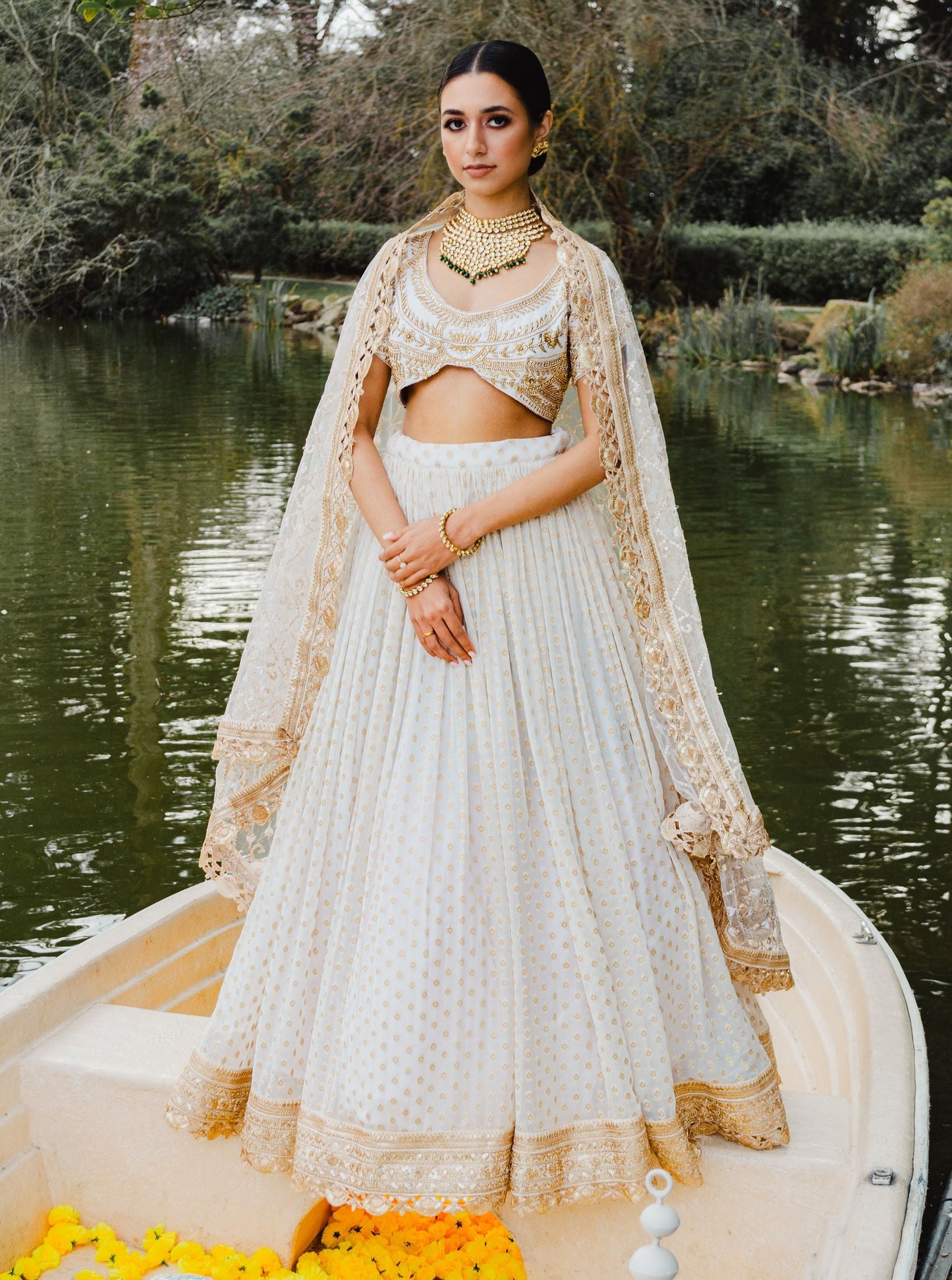 White reception lehenga with sequin & border work
