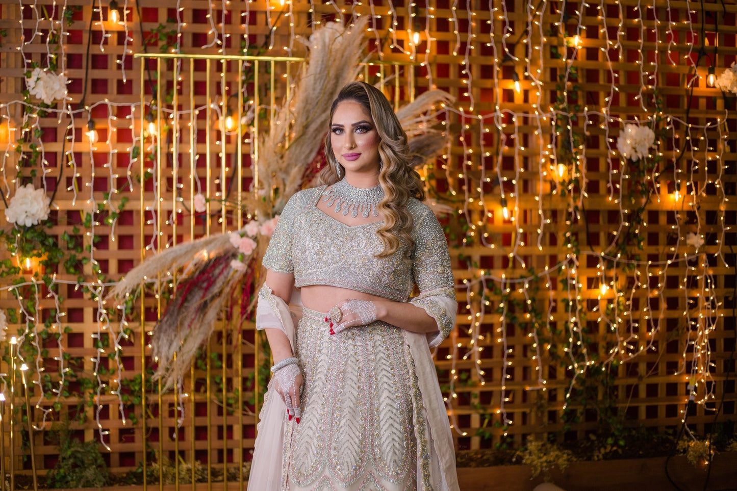 Baby Pink Netted Lehenga Choli with heavy Crystal and Sequins handwork