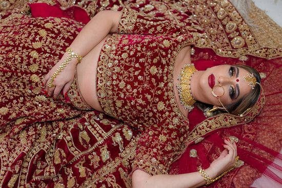 Burgundy velvet bridal lehenga choli with Zerkon, Dabka & Cutdana handwork