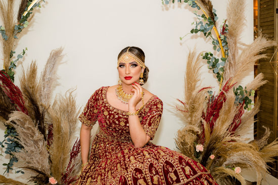 Burgundy velvet bridal lehenga choli with Zerkon, Dabka & Cutdana handwork