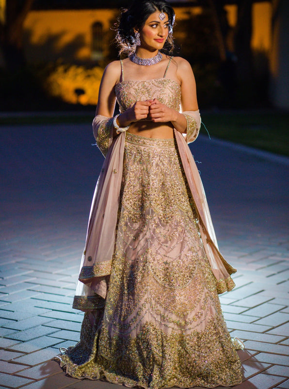 Nude net designer Lehenga choli with heavy Zari, Crystal & Sequins embroidery