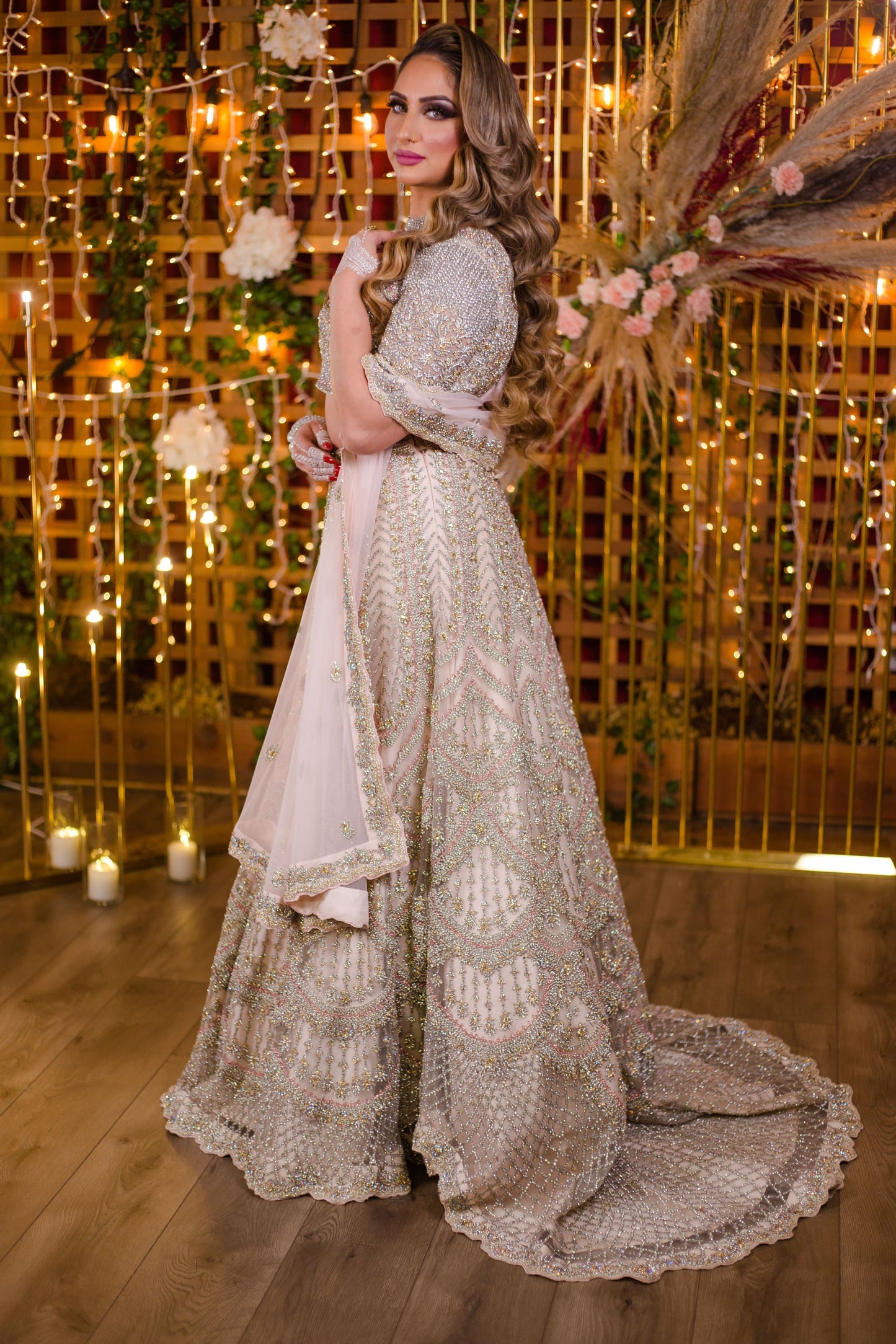 Load image into Gallery viewer, Baby Pink Netted Lehenga Choli with heavy Crystal and Sequins handwork
