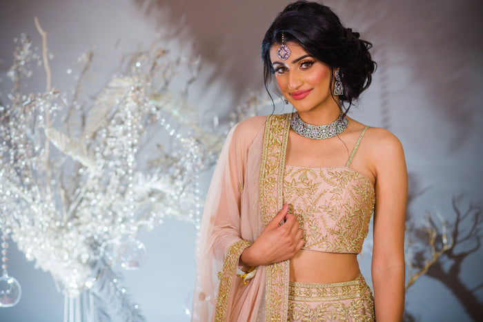 Nude net designer Lehenga choli with heavy Zari, Crystal & Sequins embroidery