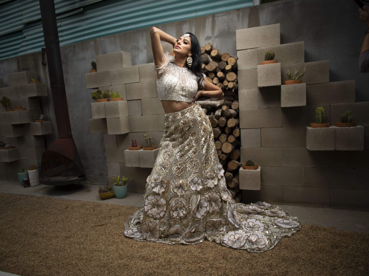 silver indian wedding dress Delicately crafted white and silver bridal look. The 3 part set takes inspiration from French florets over a soft cotton colored net canvas. Lehenga comes lined with silver and white jacquard. #Netfabricbridal #