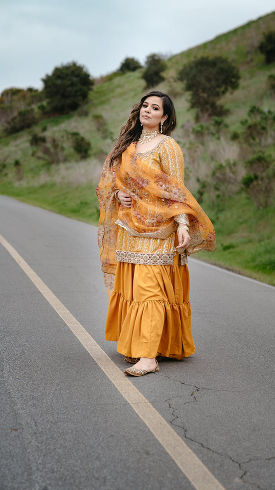 Party wear yellow sharara suit