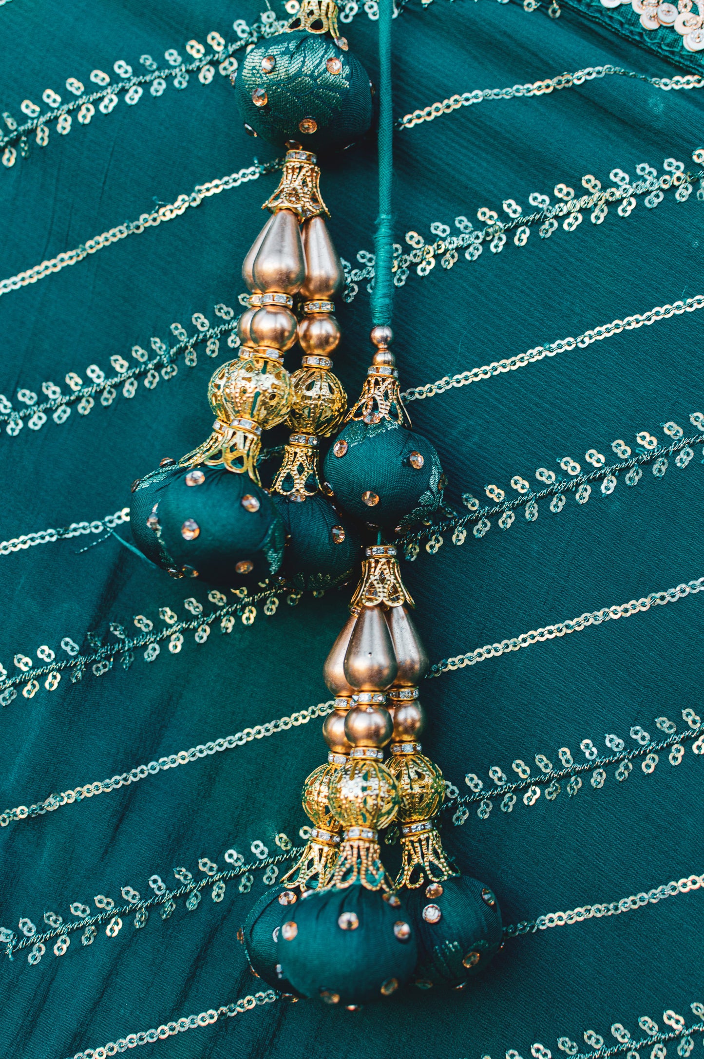 Teal green lehenga with beaded dori