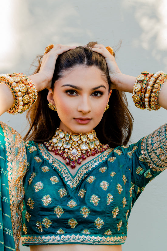 Green lehenga choli with golden sequin and dabka embroidery