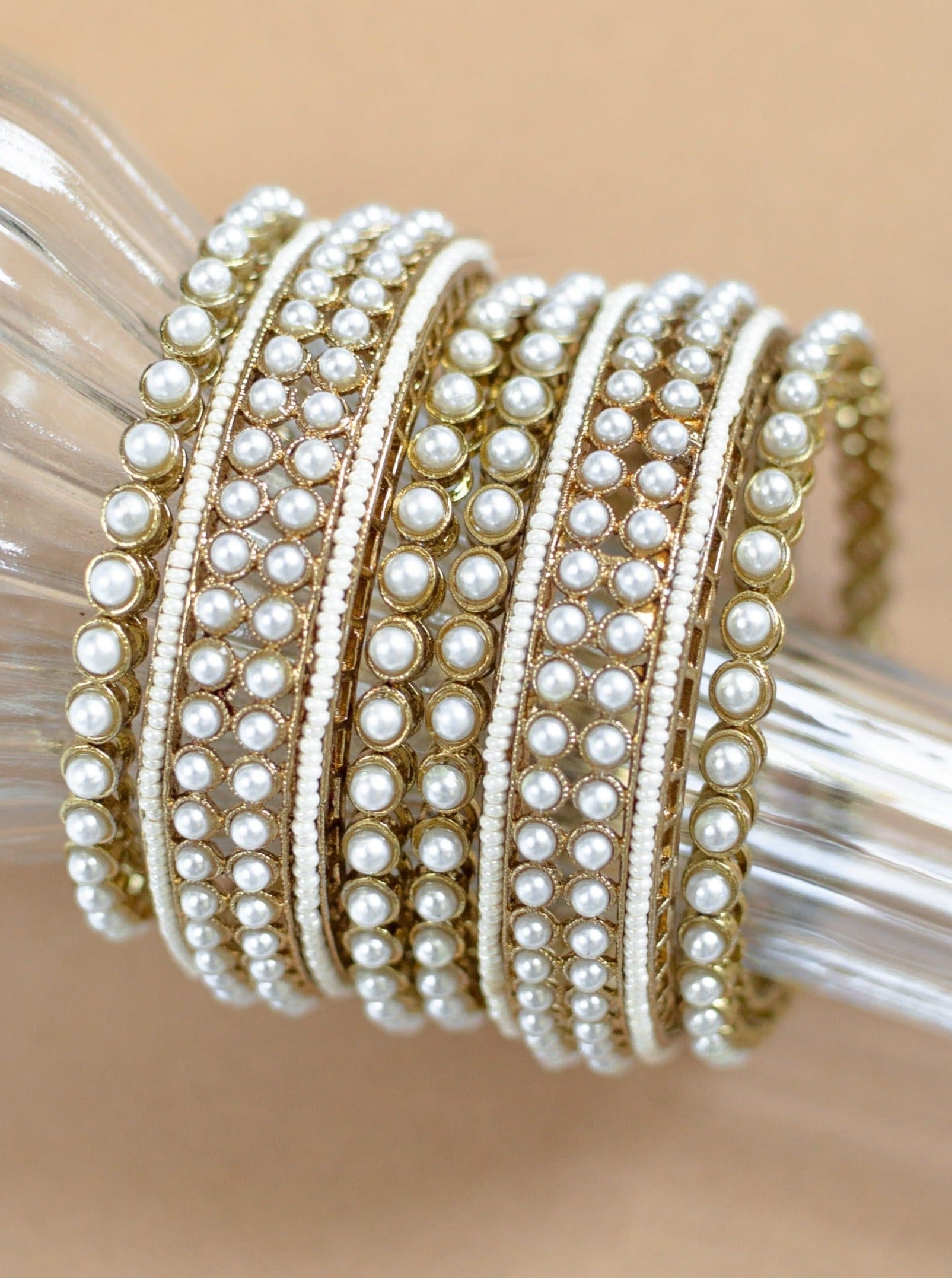 Indian bridal jewelry - pearl bangles in gold