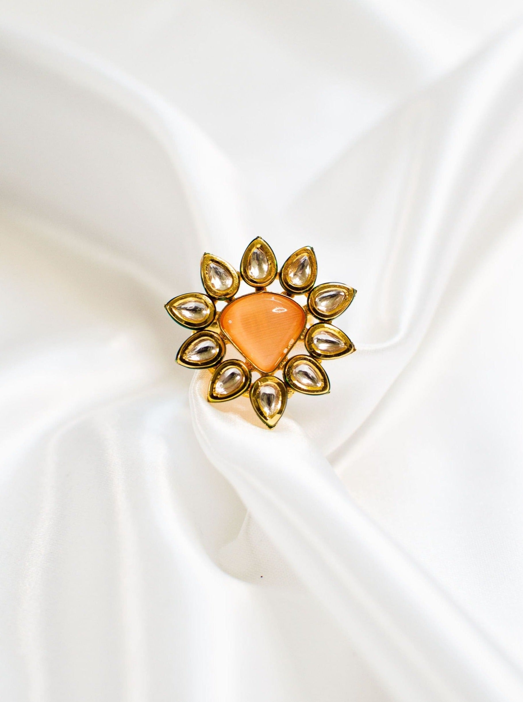 Orange stone ladies' ring with Kundan gemstones