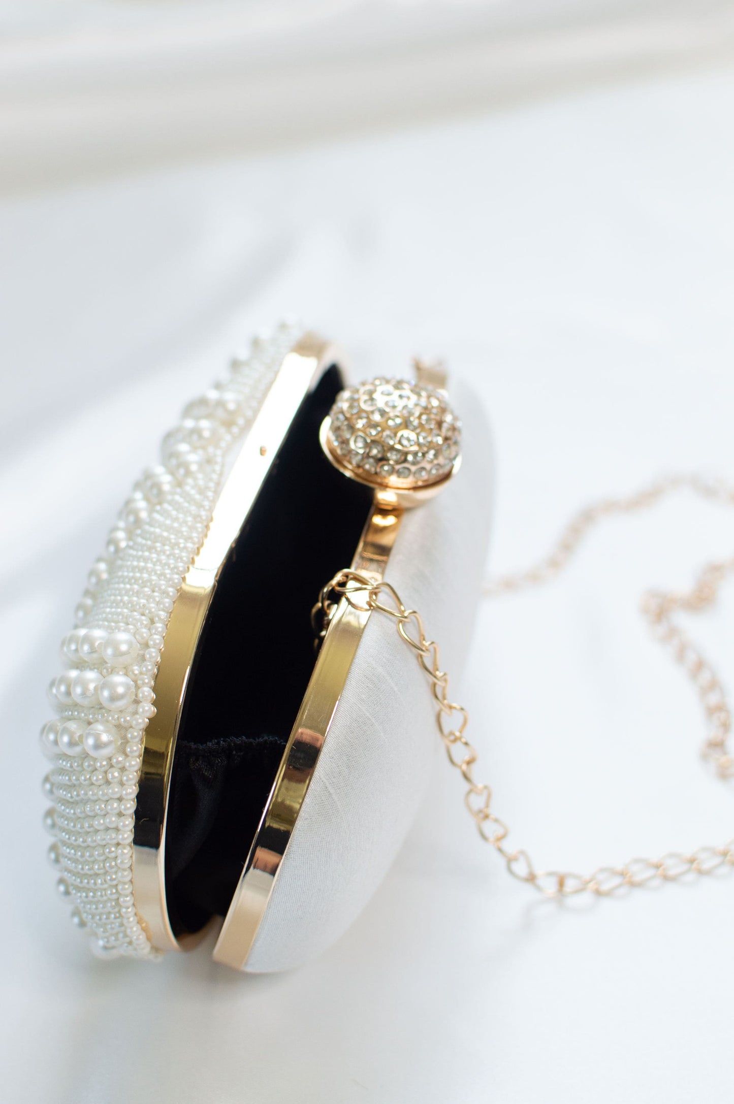 Pearly white ladies clutch for parties or bridal occasion