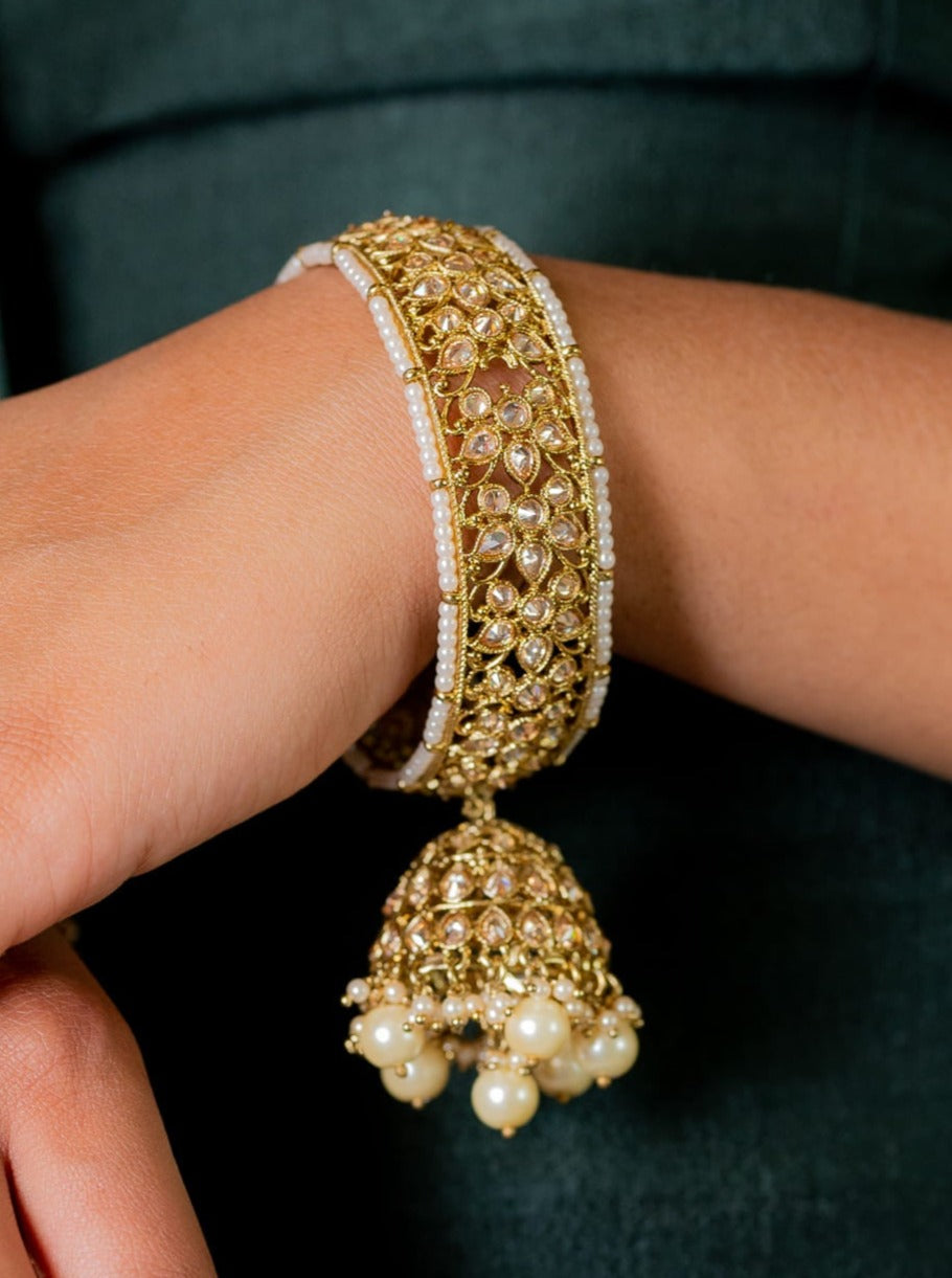 Load image into Gallery viewer, Kundan engraved gold bangles with Pearl dangling butta for Indian Women
