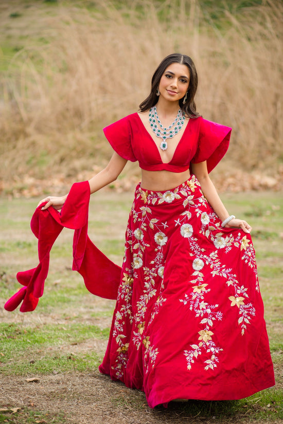 Load image into Gallery viewer, Hot pink Velvet Embroidered Lehenga choli with attached frill dupatta
