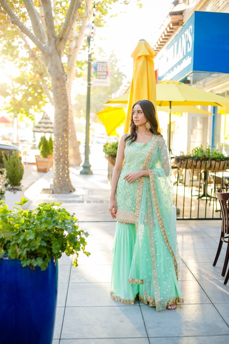Mint Green Sharara Suit: Sleeveless kurti with heavy embroidery Banu Designs Mint Green Sharara Suit: Sleeveless kurti with heavy embroidery Banu Designs