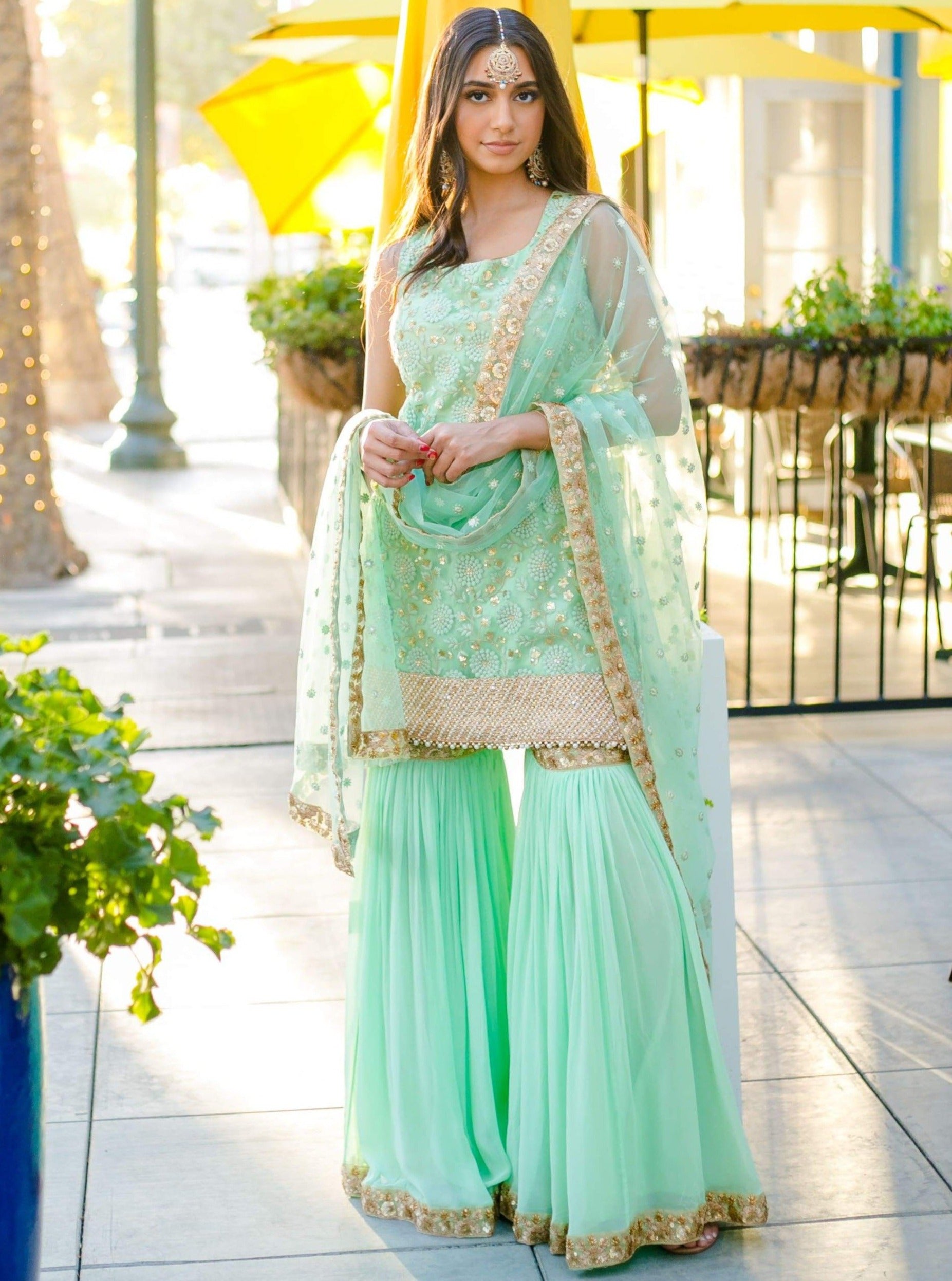 Mint Green Sharara Suit: Sleeveless kurti with heavy embroidery