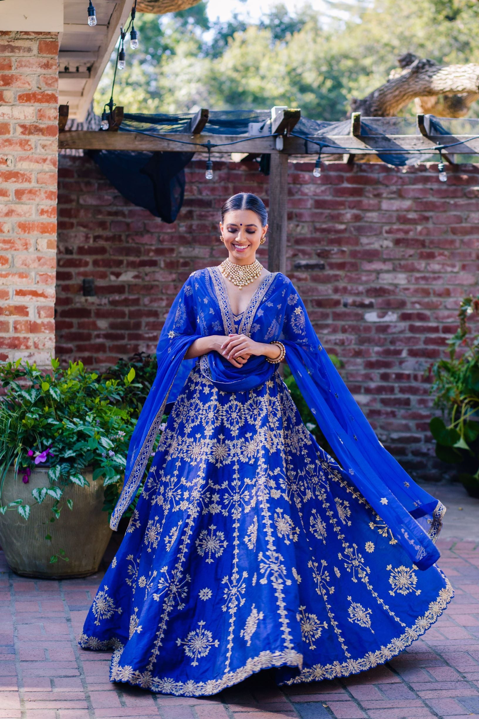 SHAN Wedding & Designer Clothes - Shan Wedding & Designer Studio here  represents one of our couple wearing royal blue lehenga and indowestern for  their engagement ceremony. It was our pleasure to