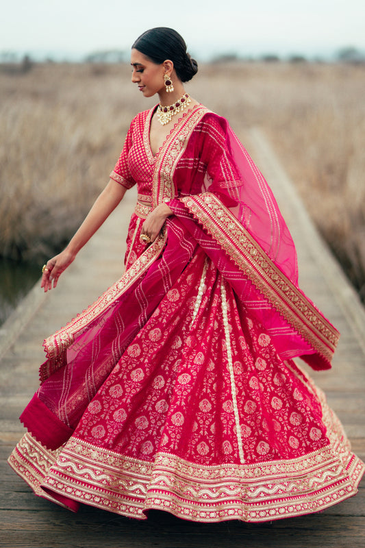 Traditional Fusia Pink Brocade Lehenga choli with embellished border